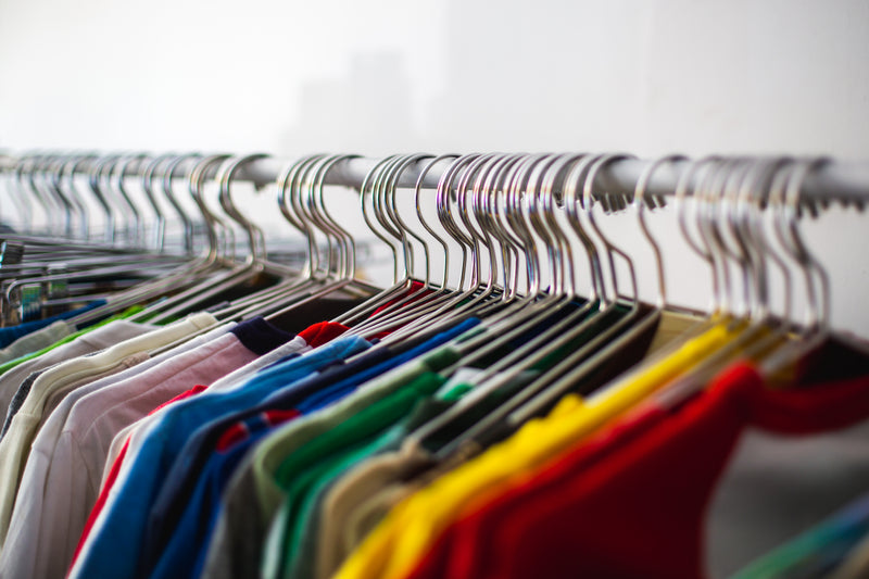 multiple colored shirts along a rail - Image of customer lifetime, Customer Lifetime Value