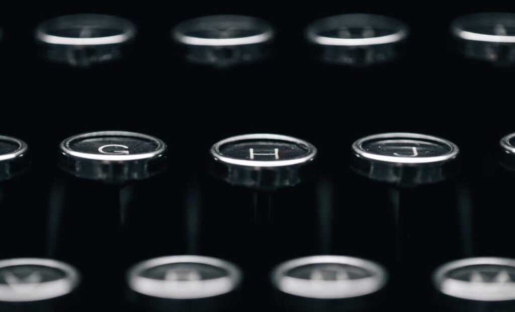 rows of typewriter letters - Image of Technology, AI content writer